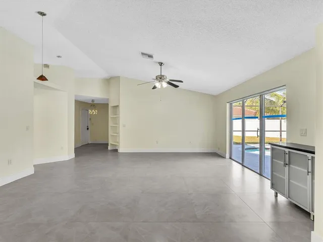 a view of a yard in front of a house