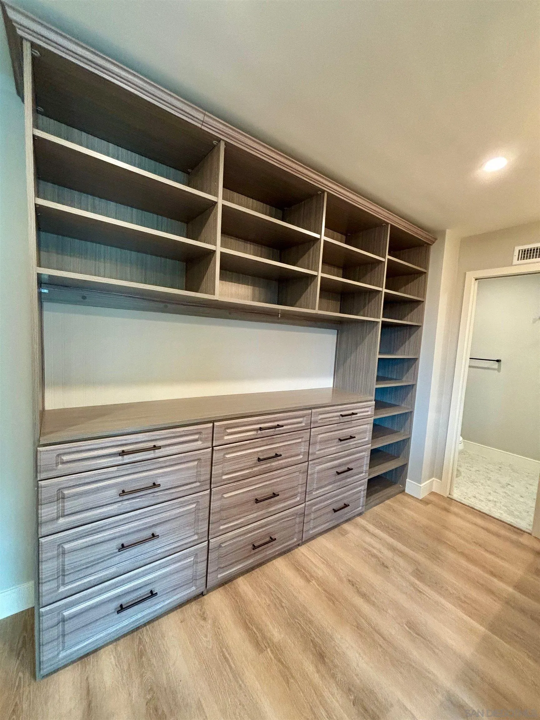 4856 Pacifica Drive San Diego, CA 92109 - Photo 23 of 32 a view of an empty walk in closet
