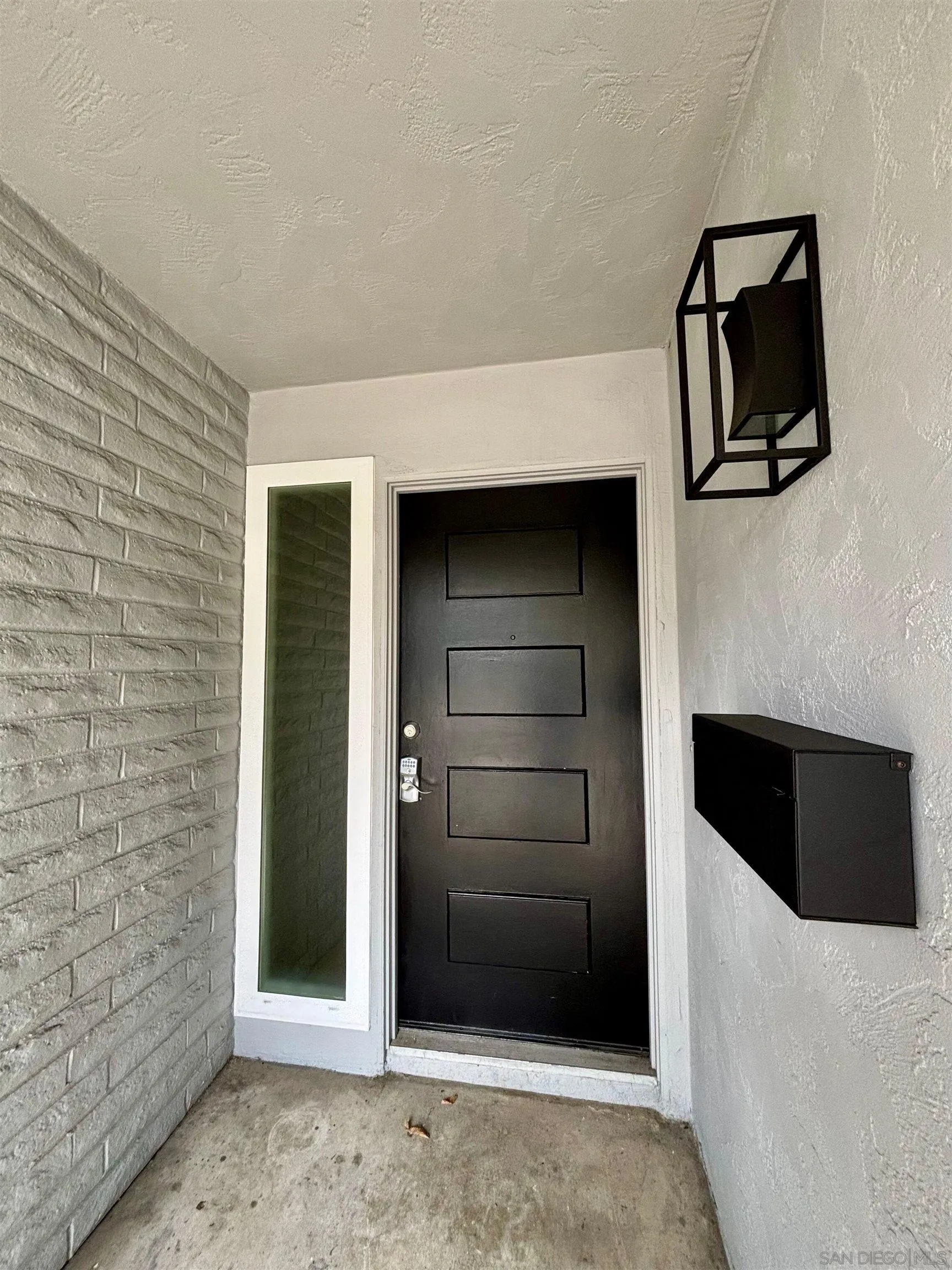 4856 Pacifica Drive San Diego, CA 92109 - Photo 31 of 32 a view of front door of house