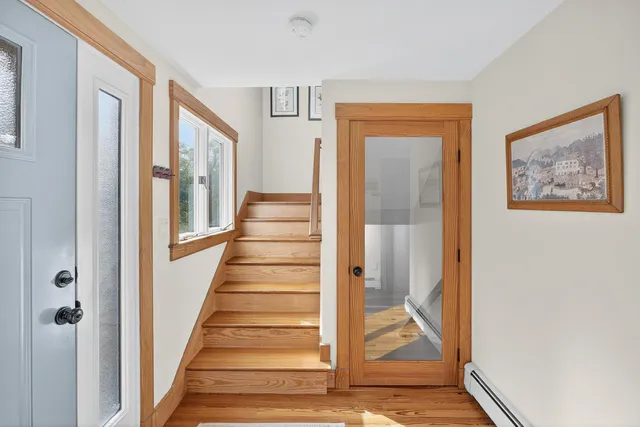 a view of a balcony with furniture