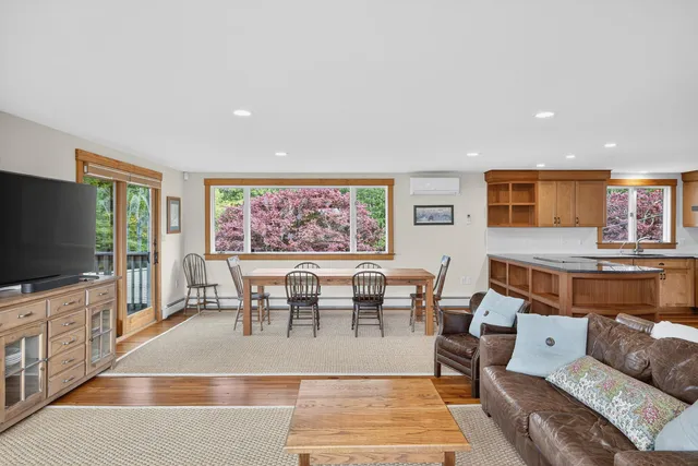 a view of a yard with a large tree