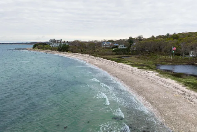 a kitchen with a sink stove and refrigerator