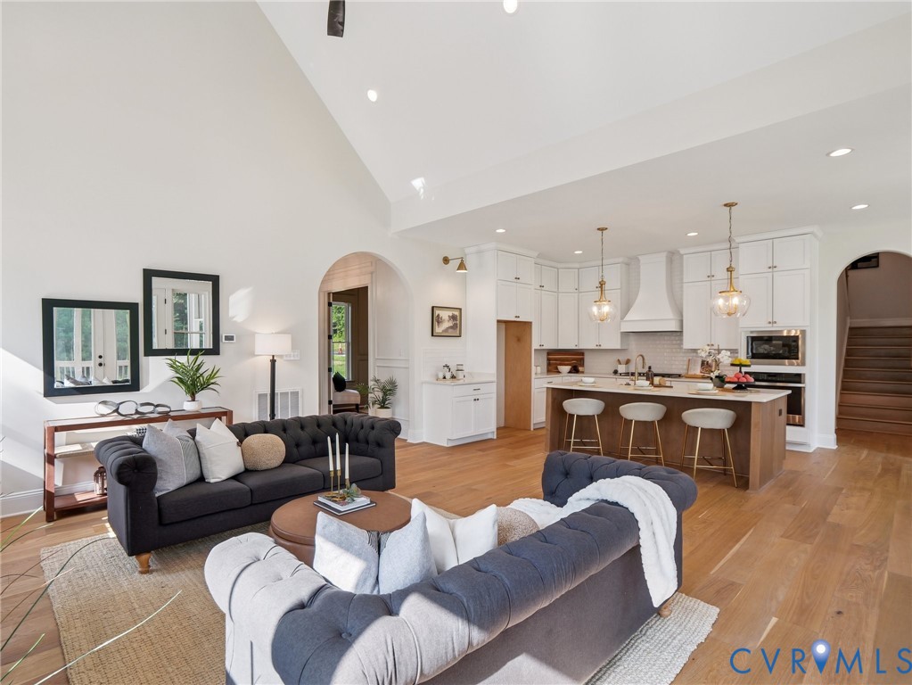 1530 Smokey Rdg Road Maidens, VA 23102 - Photo 15 of 42 a living room with furniture kitchen view and a chandelier