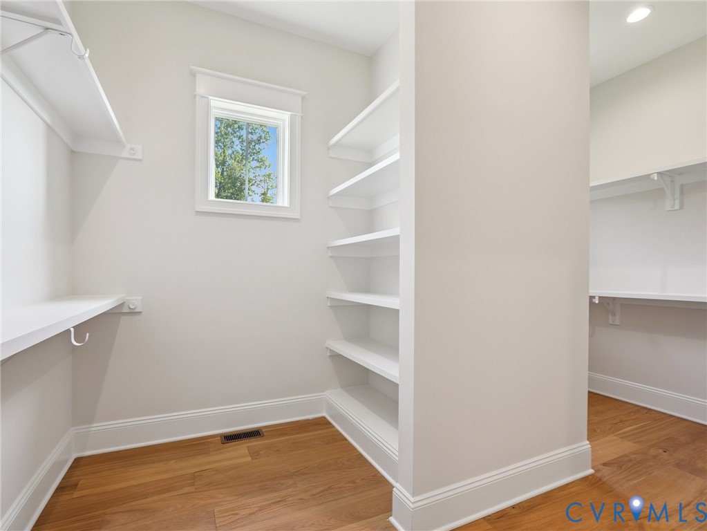 1530 Smokey Rdg Road Maidens, VA 23102 - Photo 21 of 42 a view of an empty room with wooden floor and closet