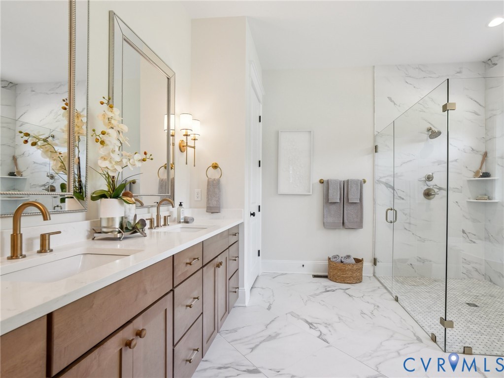 1530 Smokey Rdg Road Maidens, VA 23102 - Photo 22 of 42 a spacious bathroom with a double vanity sink mirror and shower