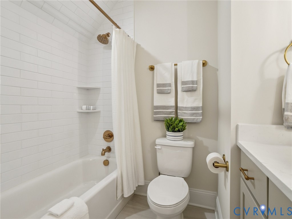 1530 Smokey Rdg Road Maidens, VA 23102 - Photo 32 of 42 a white toilet sitting next to a bath tub