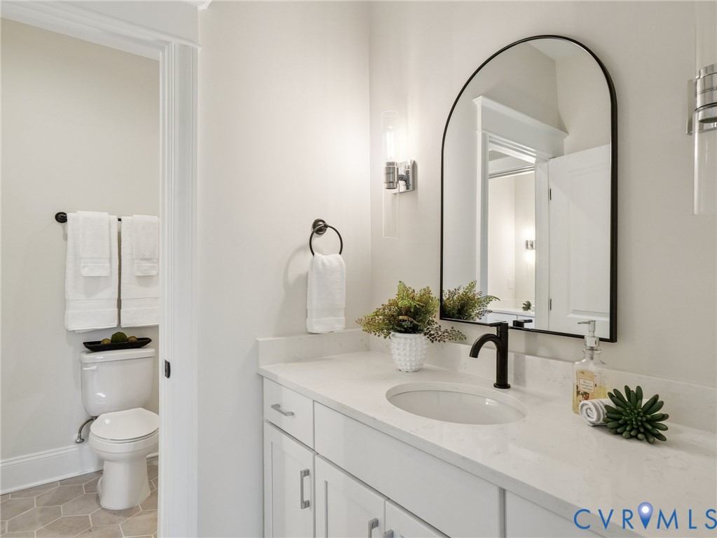 1530 Smokey Rdg Road Maidens, VA 23102 - Photo 36 of 42 a bathroom with a sink and a mirror