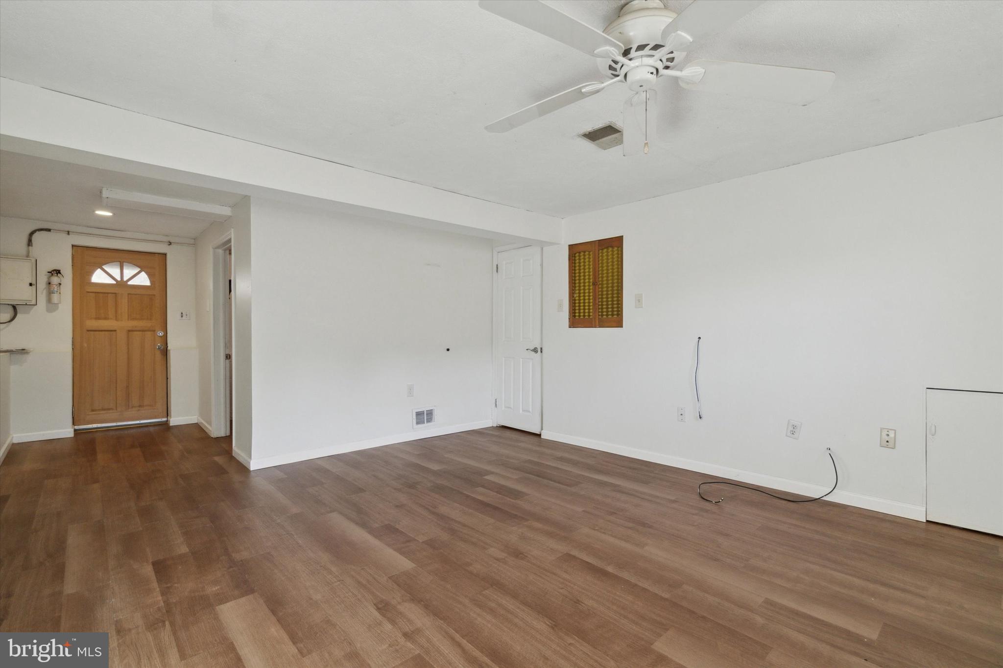 17 Pearson Circle Springfield, PA 19064 - Photo 19 of 34 Lower Level Rec Room With Lamiate Floorig