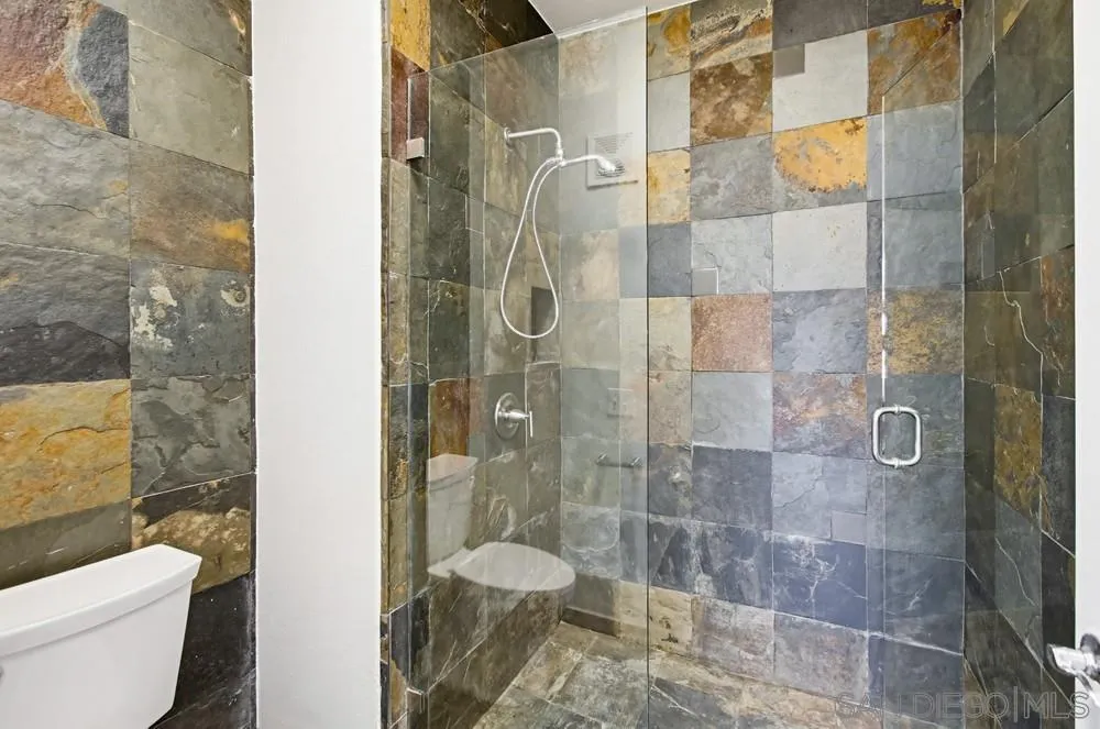 9229 Regents Road, Unit L206 La Jolla, CA 92037 - Photo 14 of 29 a bathroom with a shower and toilet