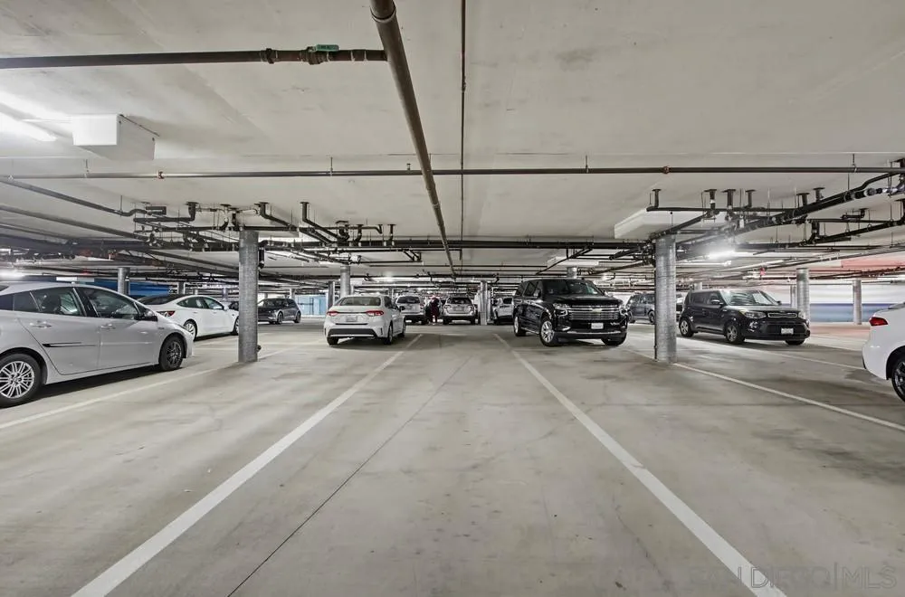 9229 Regents Road, Unit L206 La Jolla, CA 92037 - Photo 28 of 29 a view of parking with cars parked