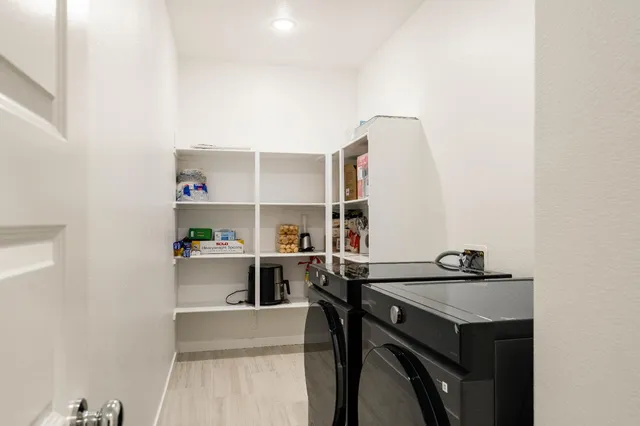 an empty room with a bathroom