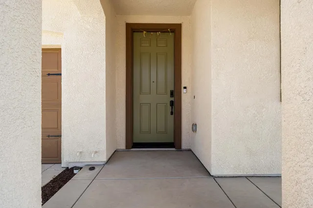 a view of a livingroom with furniture and wooden floor