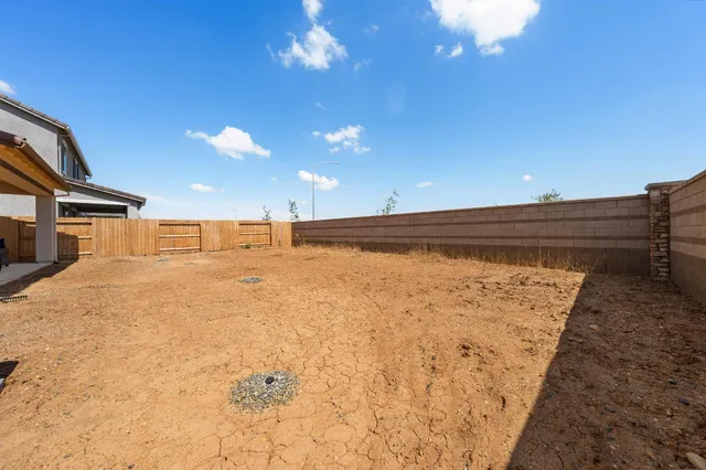 a front view of a house with yard