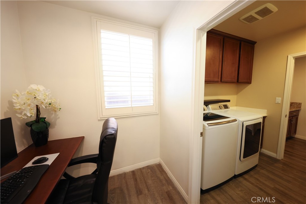 3848 Vine Maple Road San Bernardino, CA 92407 - Photo 21 of 25 a view of a workspace with furniture and wooden floor