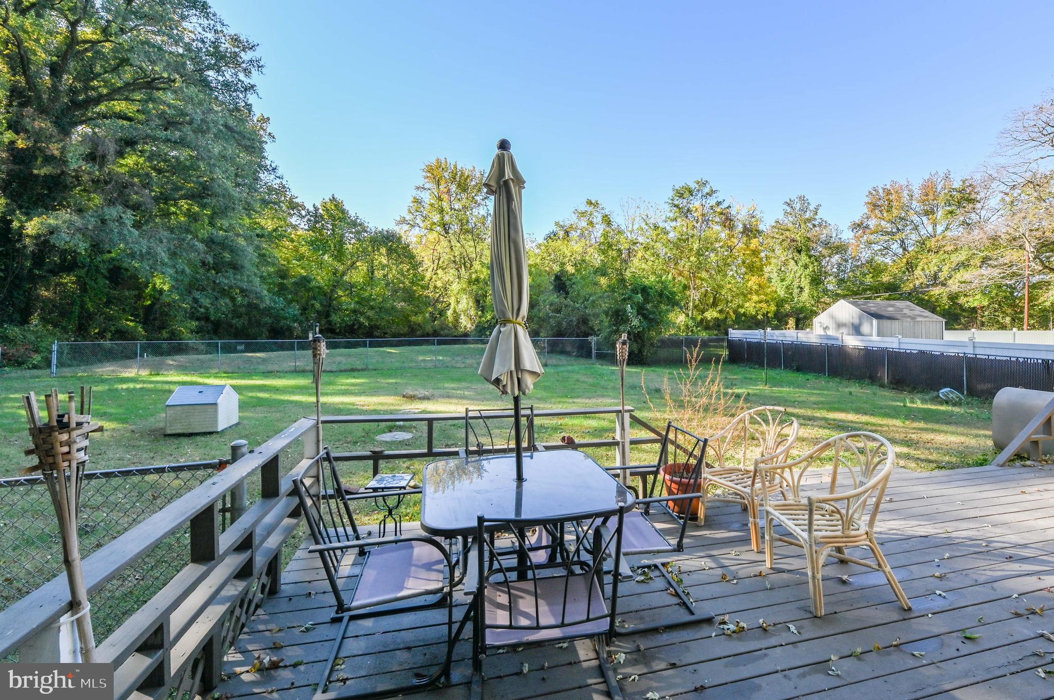 1637 Colbert Road Annapolis, MD 21409 - Photo 24 of 26 Large back deck overlooking the lawn and woods