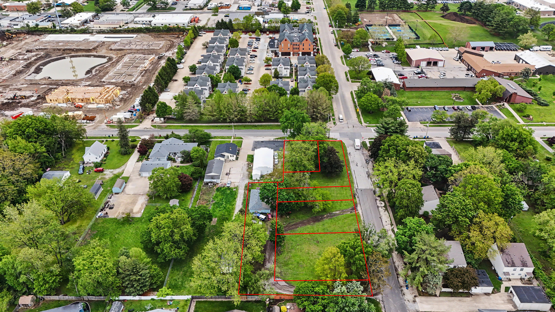 2404 West John Street Champaign, IL 61821 - Photo 12 of 24 an aerial view of residential houses with outdoor space