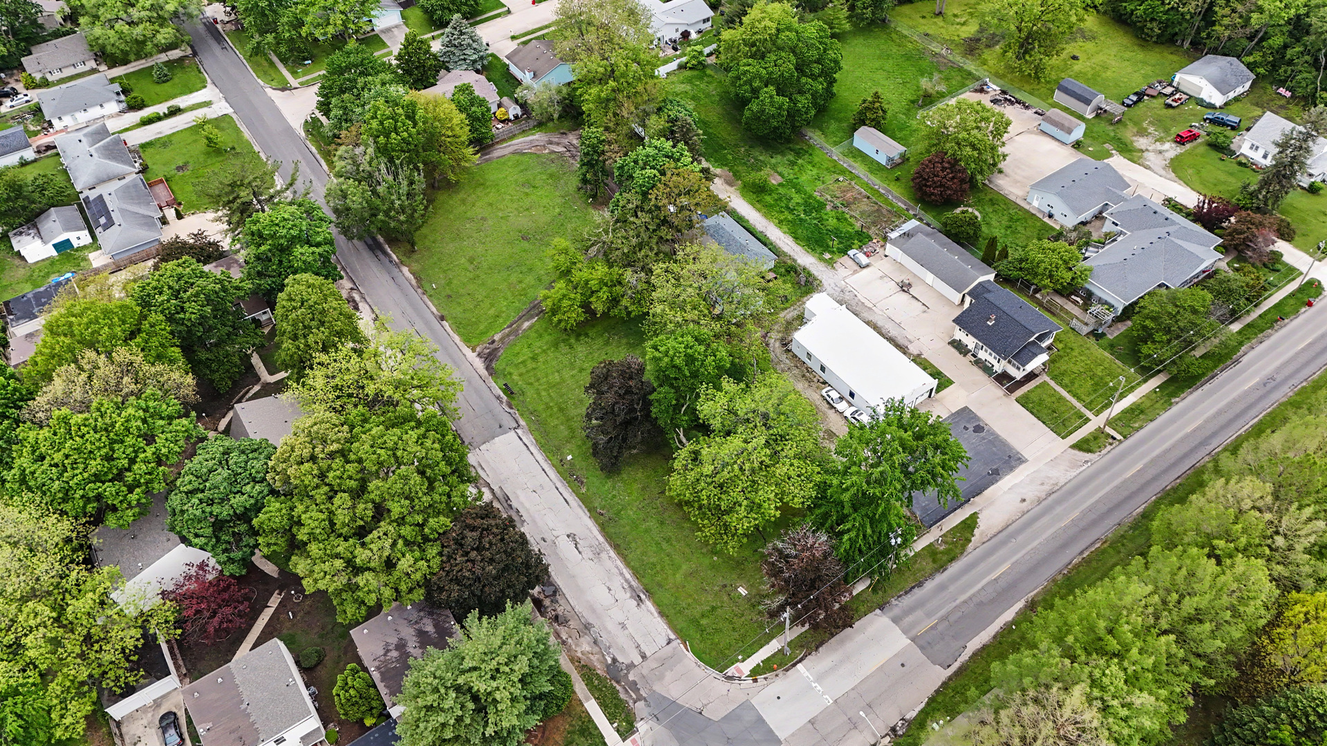 2404 West John Street Champaign, IL 61821 - Photo 15 of 24 an aerial view of a house with a yard