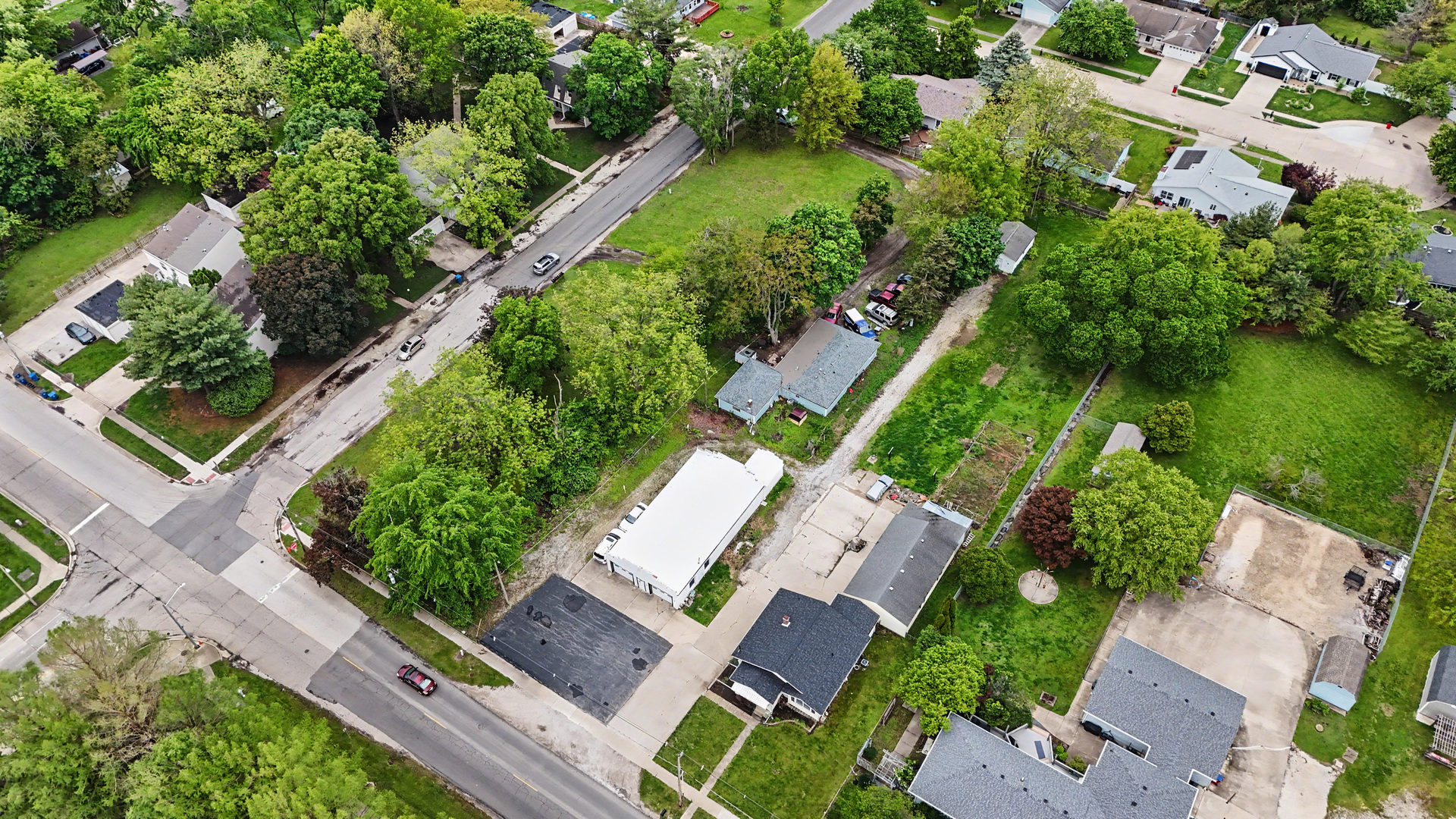 2404 West John Street Champaign, IL 61821 - Photo 17 of 24 an aerial view of residential houses with outdoor space