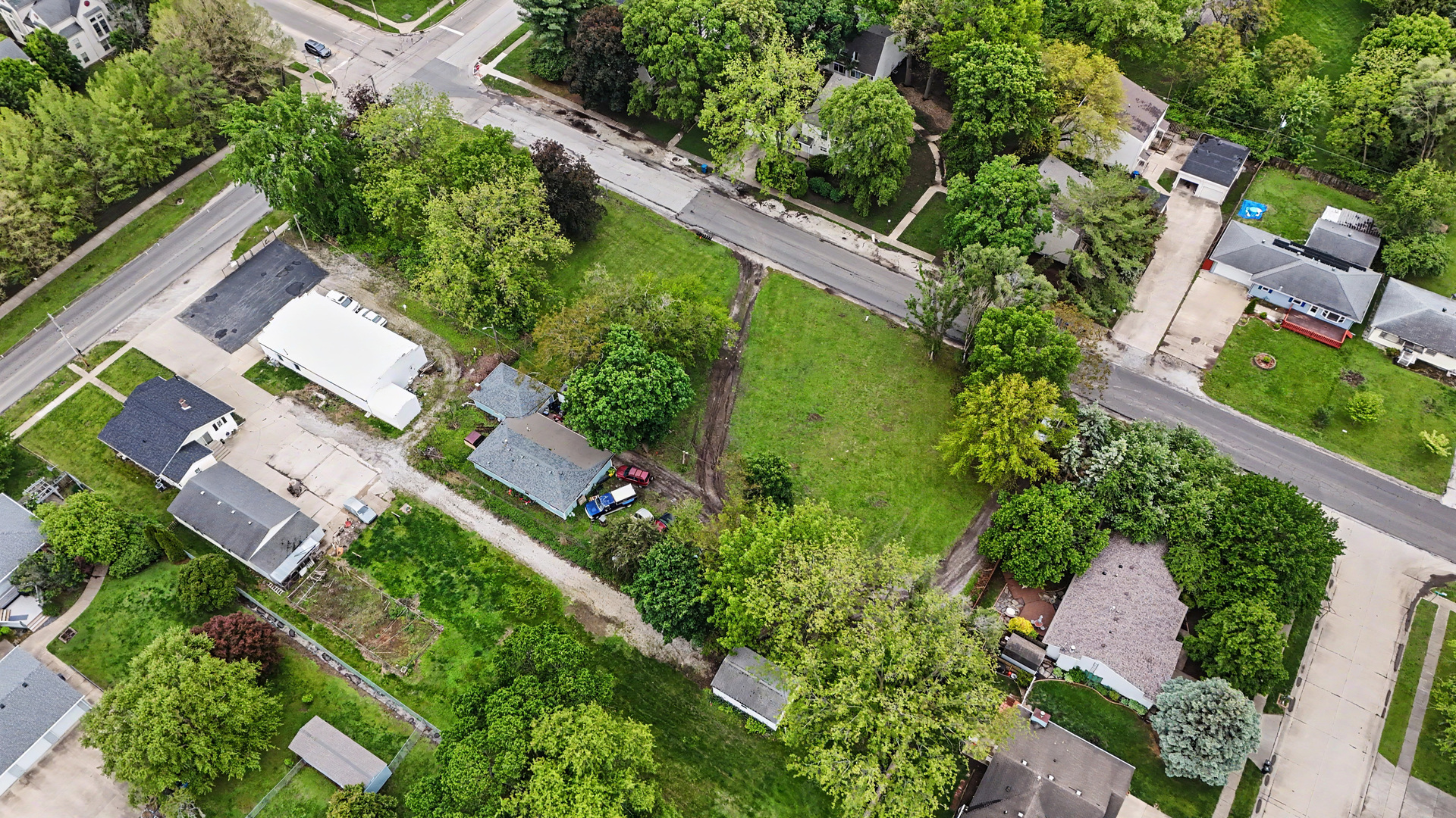2404 West John Street Champaign, IL 61821 - Photo 19 of 24 an aerial view of a house with a yard
