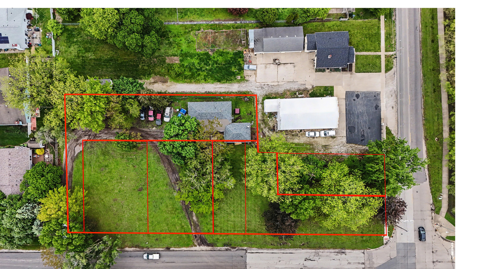 2404 West John Street Champaign, IL 61821 - Photo 5 of 24 an aerial view of a house with a garden