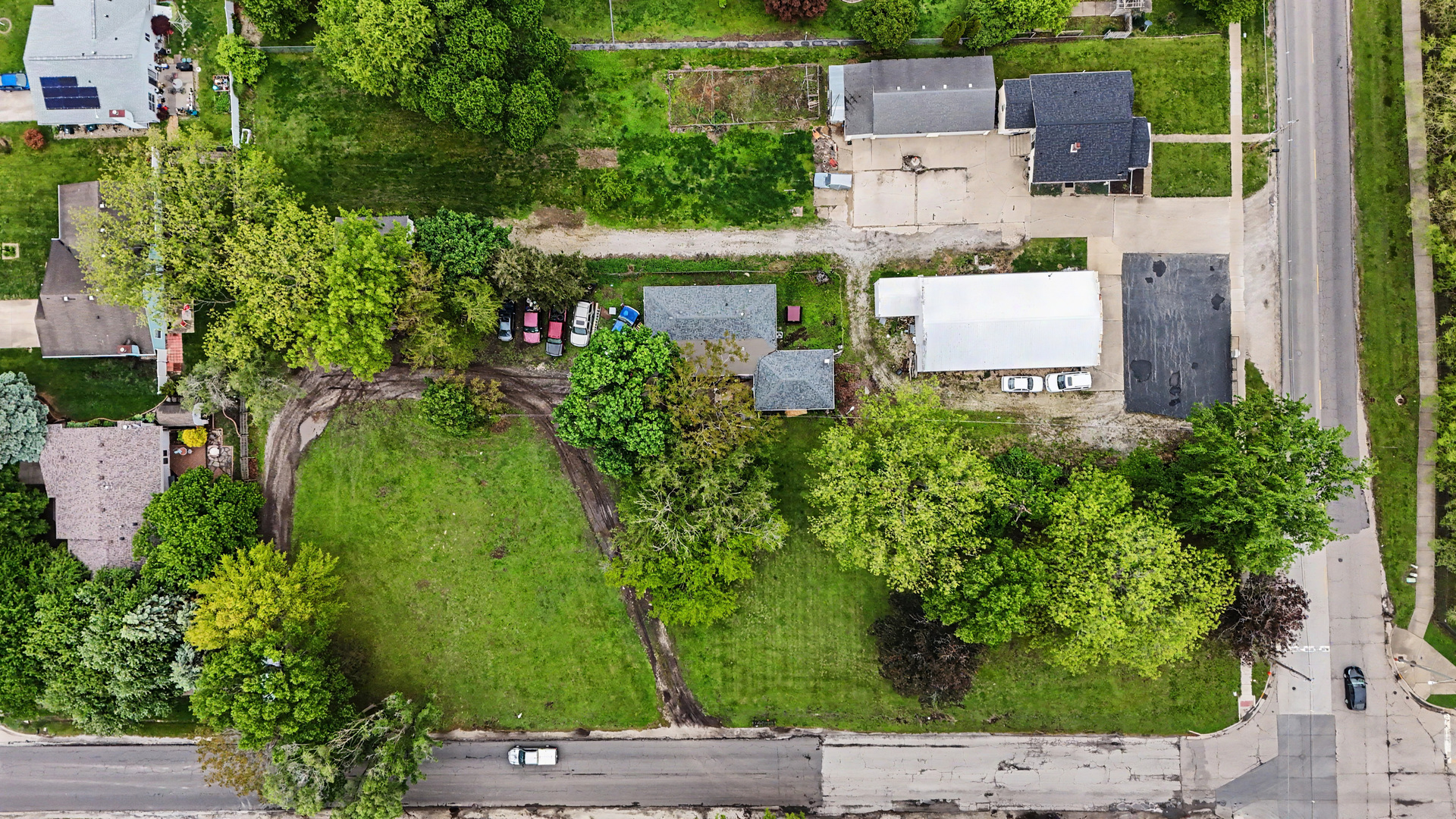 2404 West John Street Champaign, IL 61821 - Photo 6 of 24 an aerial view of a house with a garden