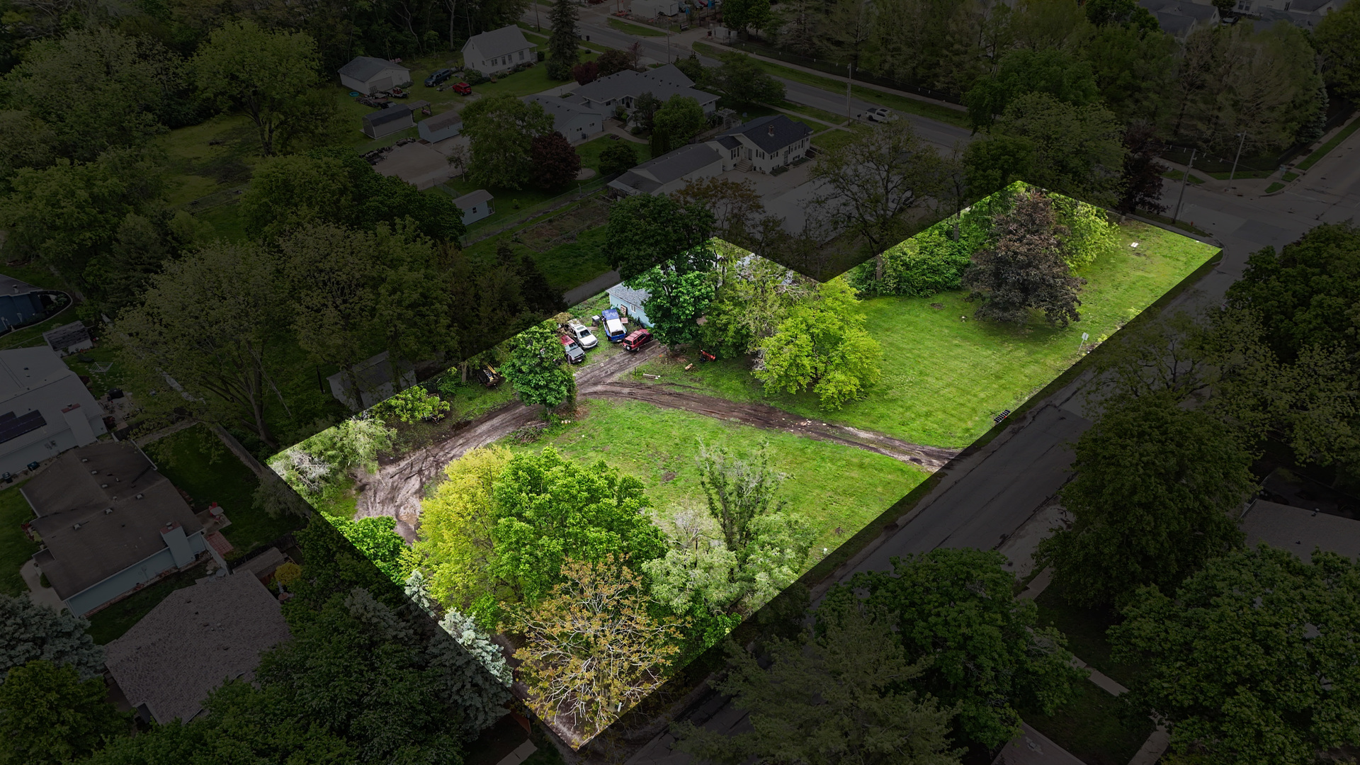 2404 West John Street Champaign, IL 61821 - Photo 7 of 24 a view of a garden in a backyard