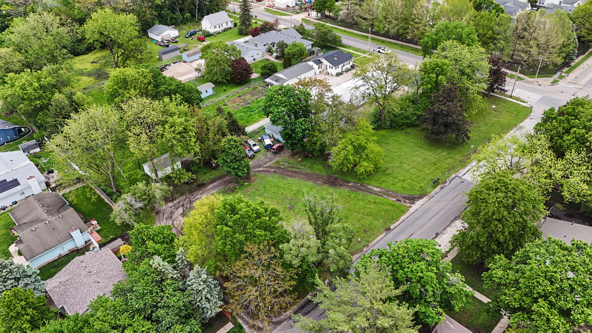 2404 West John Street Champaign, IL 61821 - Photo 9 of 24 an aerial view of a house with a yard