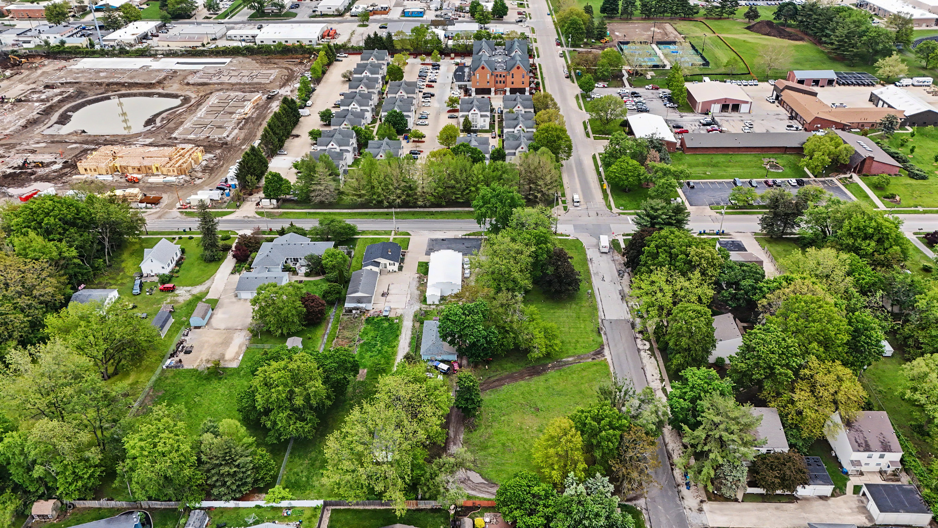 2404 West John Street Champaign, IL 61821 - Photo 10 of 24 an aerial view of residential houses with outdoor space and street view
