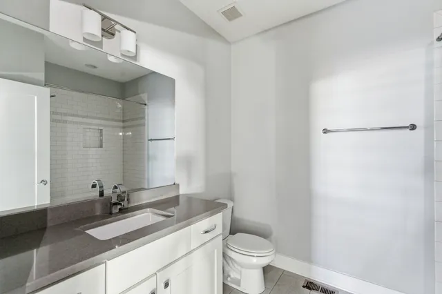a view of a balcony with wooden floor