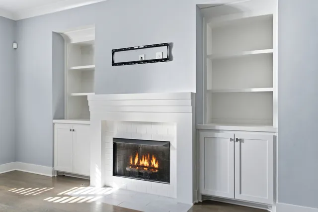 a living room with a fireplace