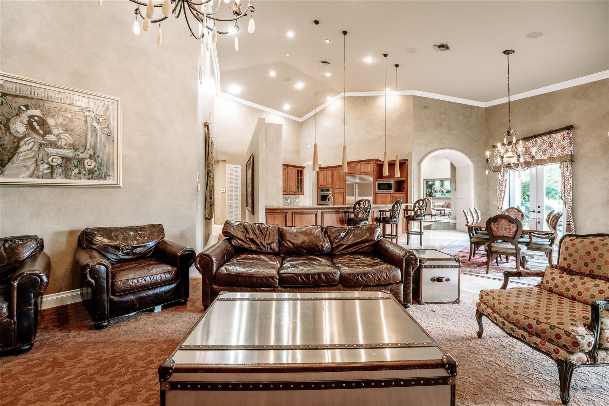 3220 Paddock Road Weston, FL 33331 - Photo 18 of 59 a living room with furniture gym equipment and a chandelier