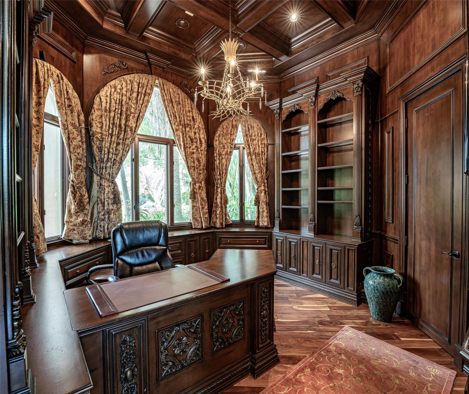 3220 Paddock Road Weston, FL 33331 - Photo 19 of 59 a very nice looking room with a large window and chandelier