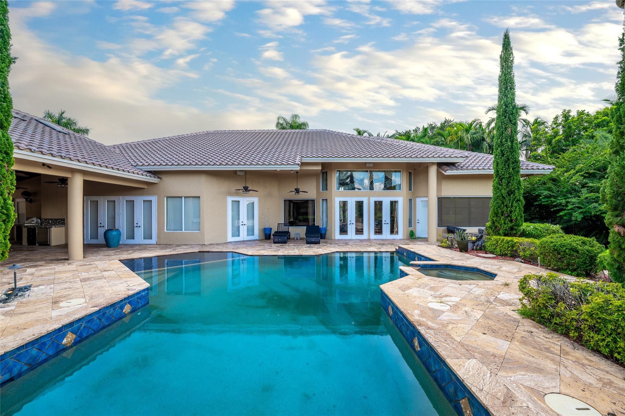 3220 Paddock Road Weston, FL 33331 - Photo 33 of 59 a view of a house with swimming pool and a yard
