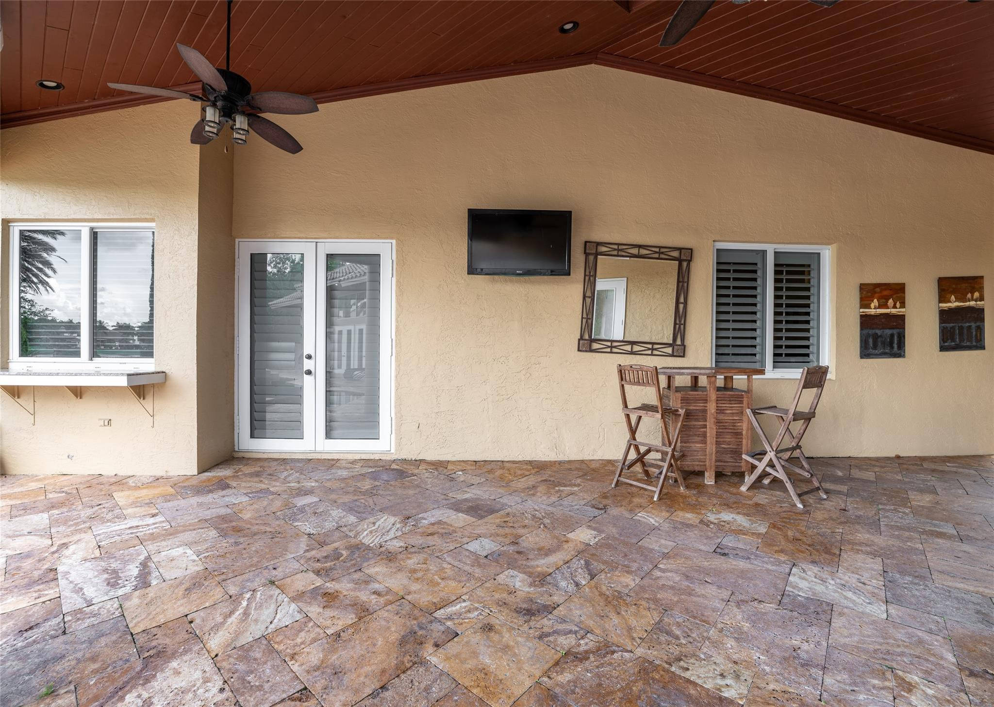 3220 Paddock Road Weston, FL 33331 - Photo 40 of 59 a view of a livingroom with a chair and table