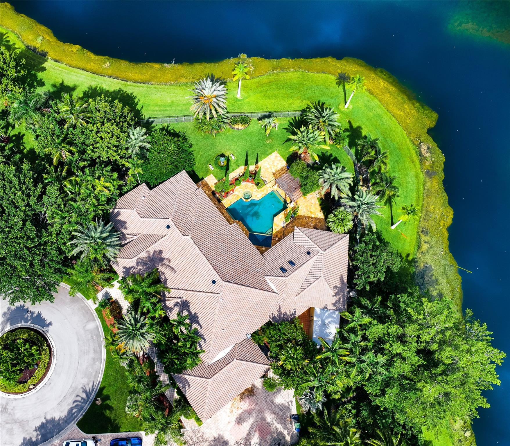 3220 Paddock Road Weston, FL 33331 - Photo 45 of 59 an aerial view of a house with a yard