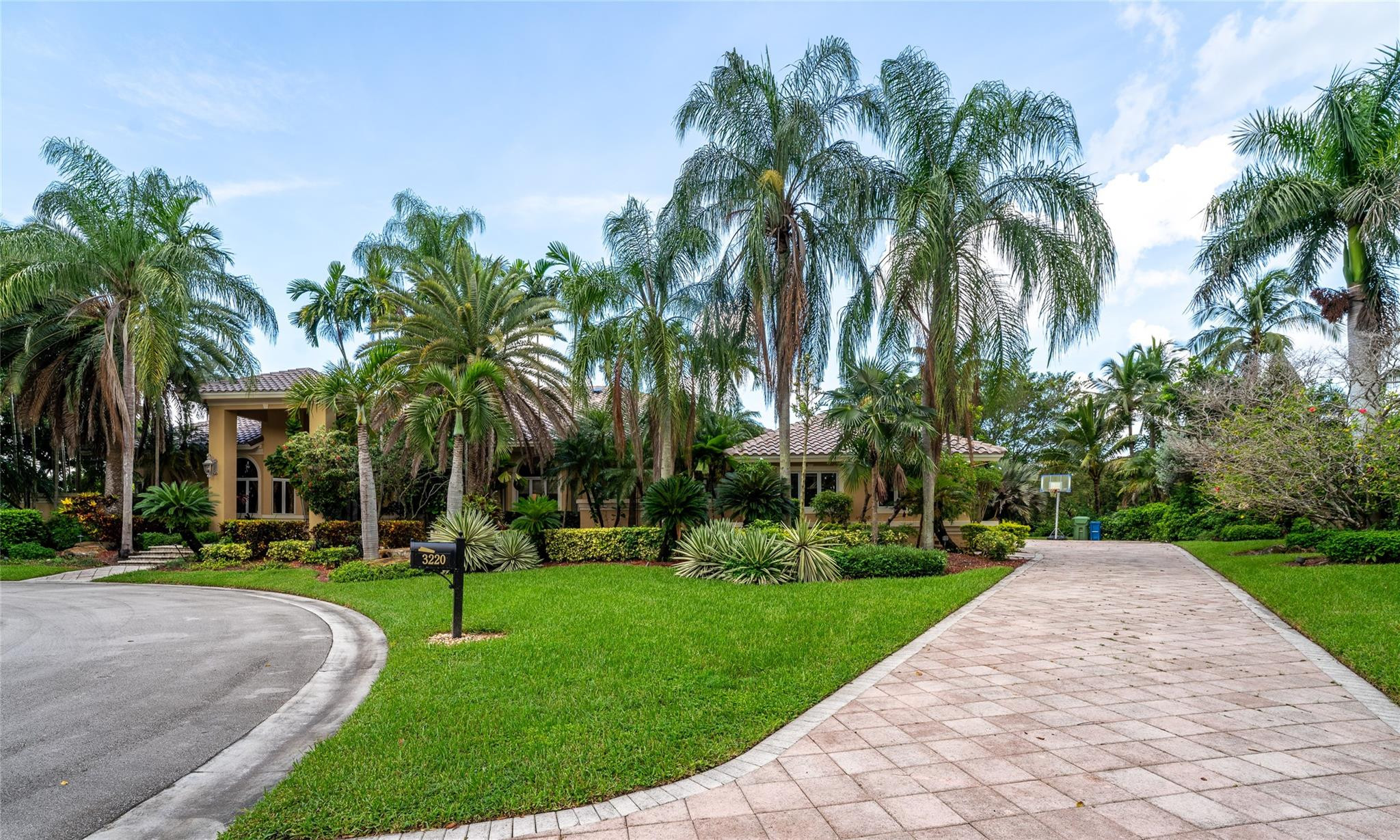 3220 Paddock Road Weston, FL 33331 - Photo 52 of 59 a view of a park with palm trees