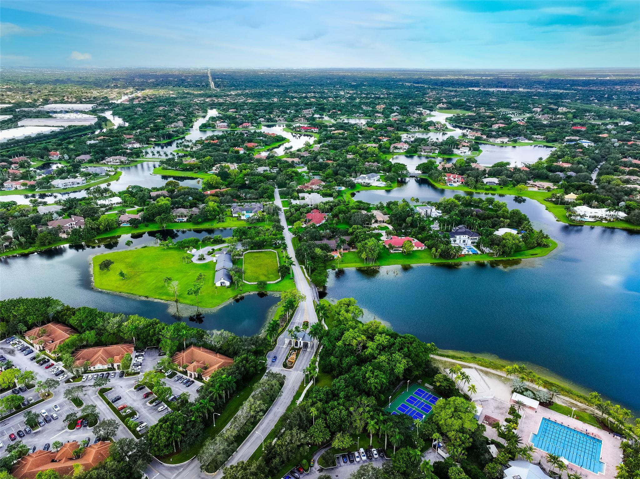 3220 Paddock Road Weston, FL 33331 - Photo 59 of 59 a view of a lake with a city