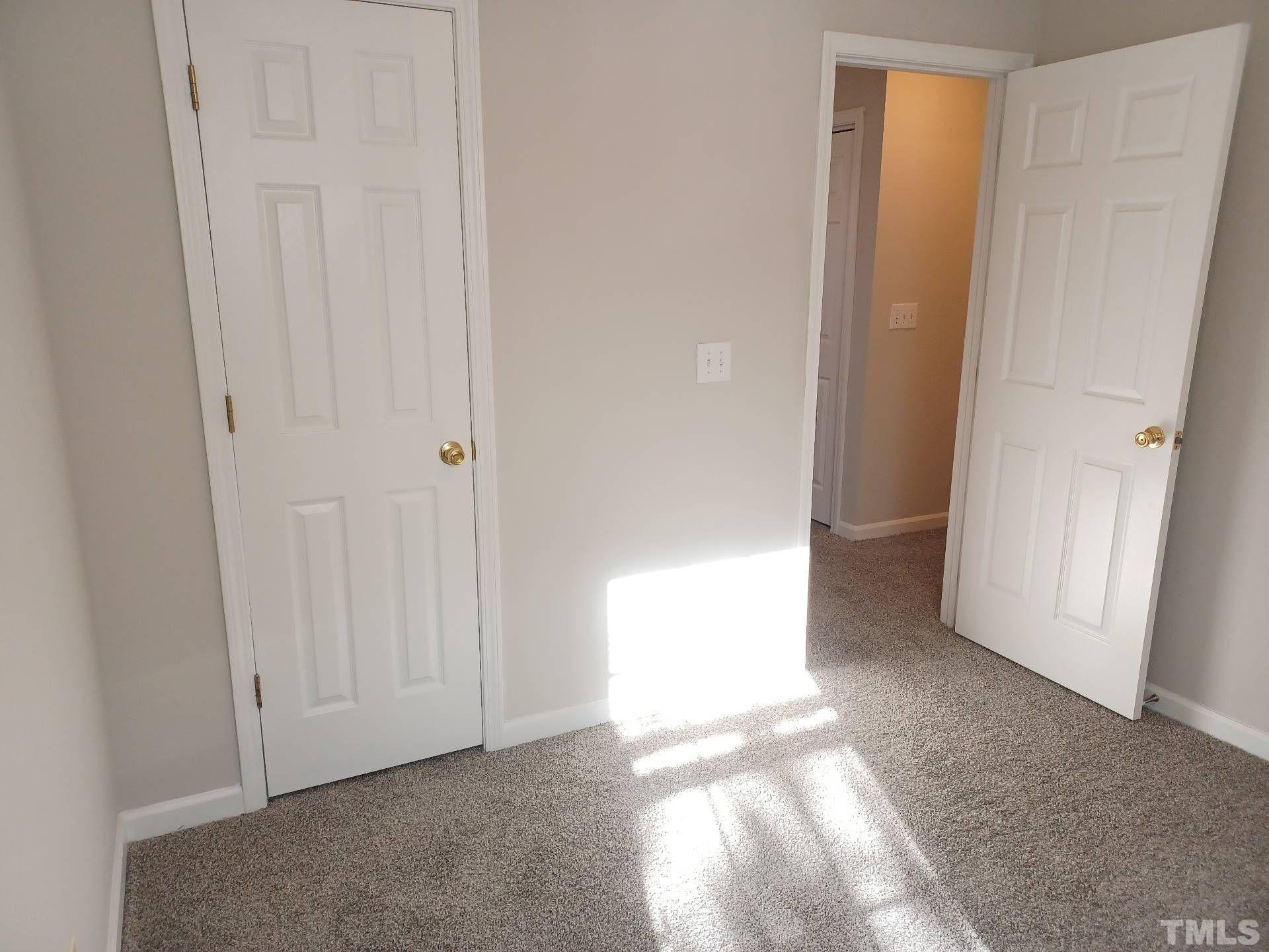 208 Lindell Drive Apex, NC 27539 - Photo 18 of 27 a view of an empty room and window