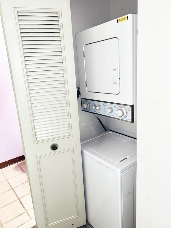 111 Devir Street, Unit 402 Malden, MA 02148 - Photo 13 of 19 a utility room with dryer and washer
