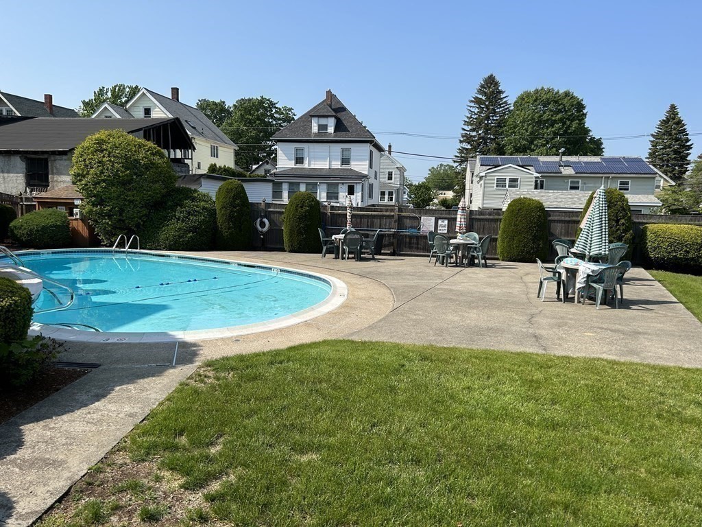 111 Devir Street, Unit 402 Malden, MA 02148 - Photo 18 of 19 a view of a house with backyard and sitting area