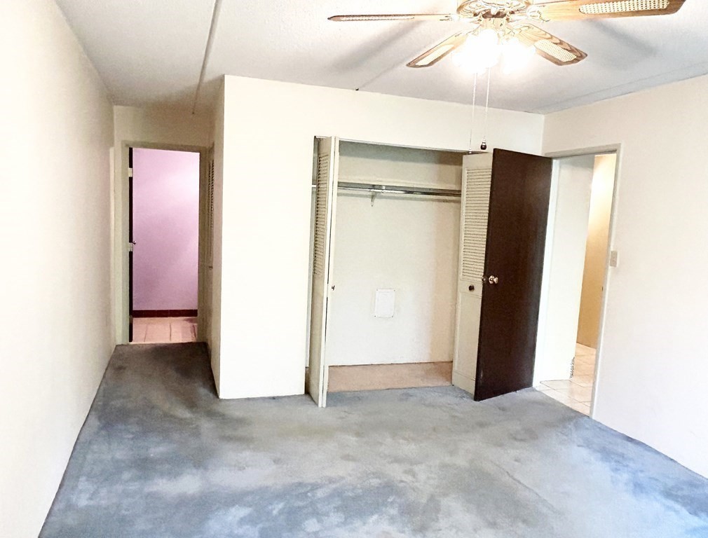 111 Devir Street, Unit 402 Malden, MA 02148 - Photo 8 of 19 a view of an empty room with a bathroom