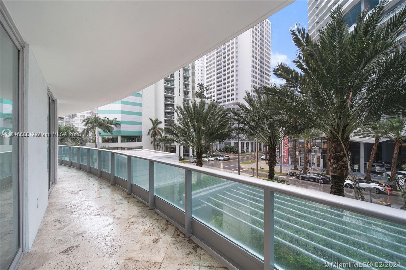 1331 Brickell Bay Drive, Unit 208 Miami, FL 33131 - Photo 21 of 29 a view of a swimming pool with a patio