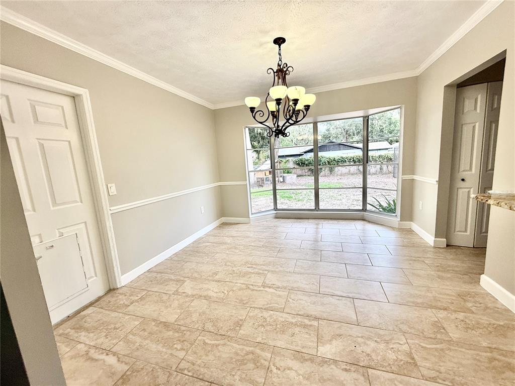 502 Oakhurst Street Brandon, FL 33511 - Photo 13 of 40 a view of an empty room with a window