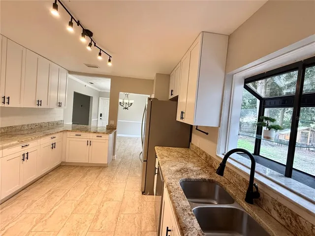 a view of kitchen and utility room