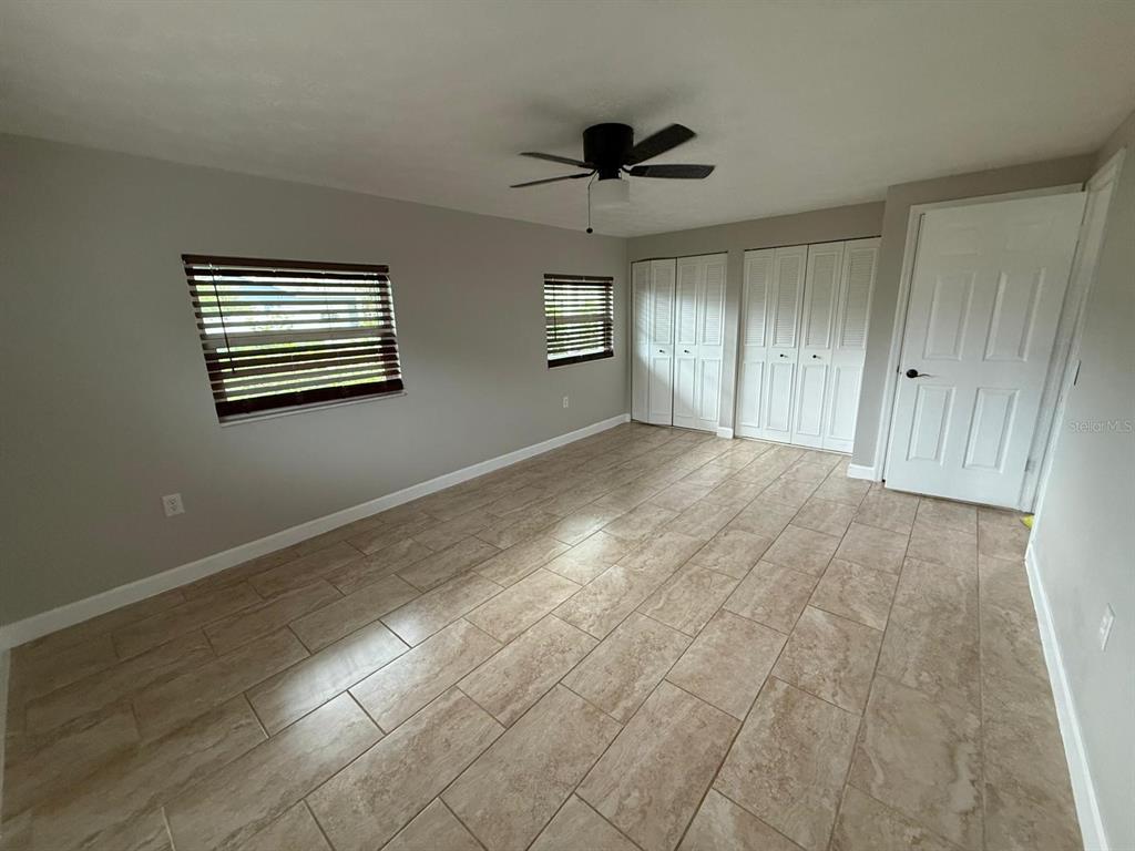 502 Oakhurst Street Brandon, FL 33511 - Photo 23 of 40 a view of an empty room with a window