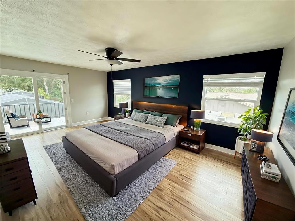 502 Oakhurst Street Brandon, FL 33511 - Photo 31 of 40 a bedroom with a bed and large windows