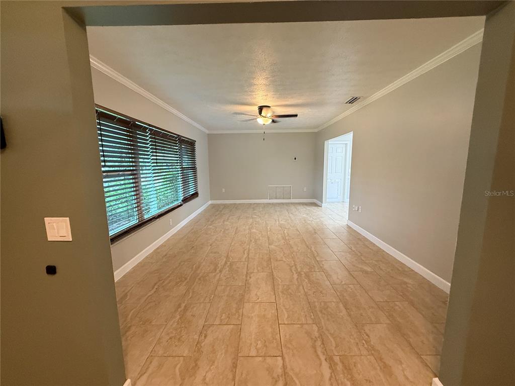 502 Oakhurst Street Brandon, FL 33511 - Photo 7 of 40 a view of an empty room with a window