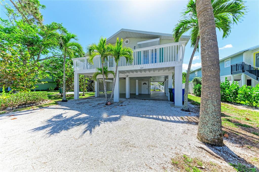 517 Spring Avenue Anna Maria, FL 34216 - Photo 2 of 50 a view of a house with a tree in front