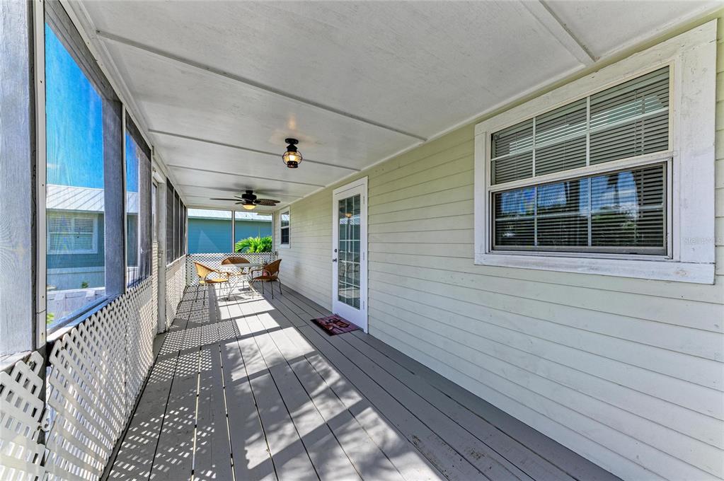 517 Spring Avenue Anna Maria, FL 34216 - Photo 33 of 50 a view of a house with a porch