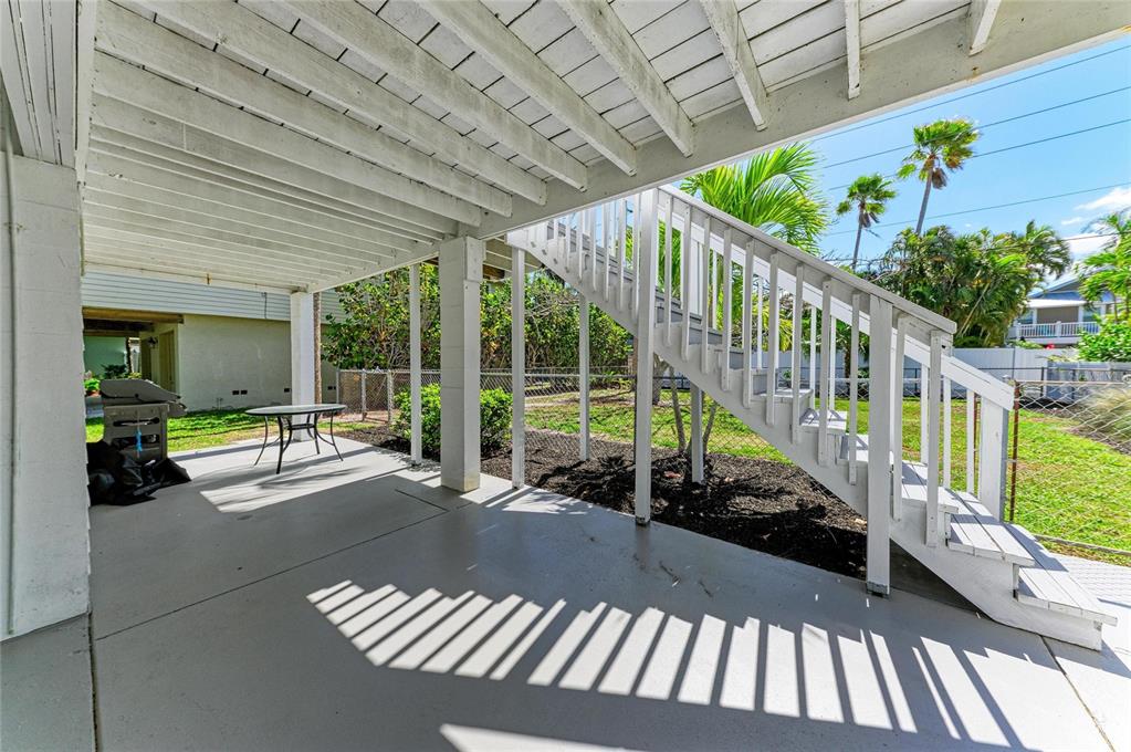 517 Spring Avenue Anna Maria, FL 34216 - Photo 40 of 50 a view of a balcony with chairs